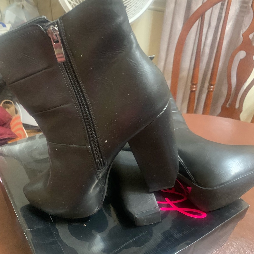 All black platform heels